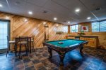 Pool table in the basement family room